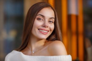 woman smiling with braces