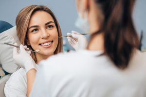 woman smiling at dental office