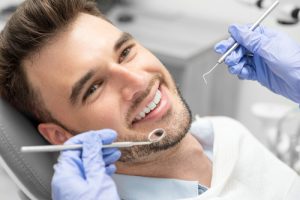 man at dentist office